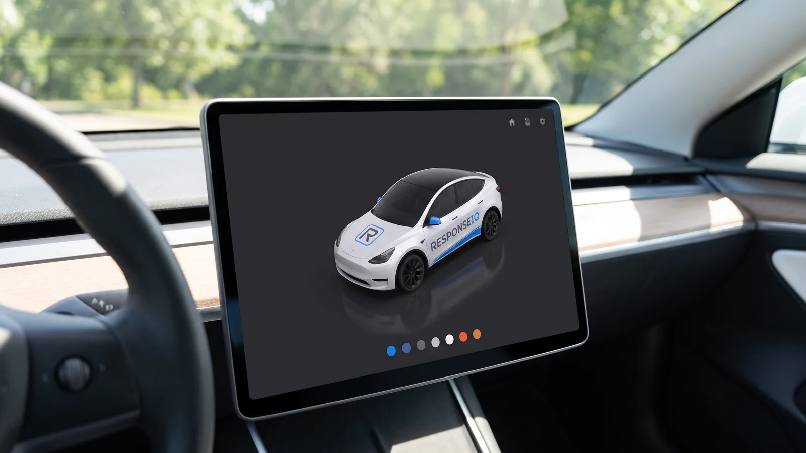 A Tesla centre touchscreen showing the white ResponseIQ-wrapped Model Y as a 3D model